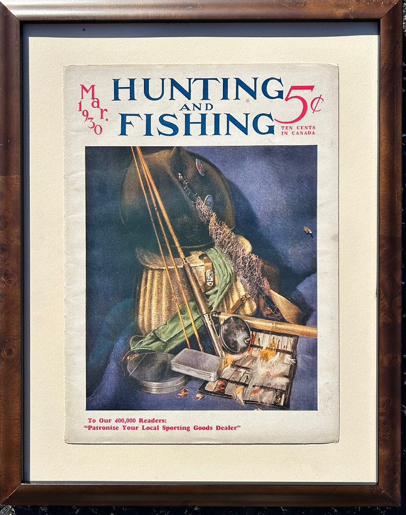 fisherman's woven creel, rod, net, tied flies in cases